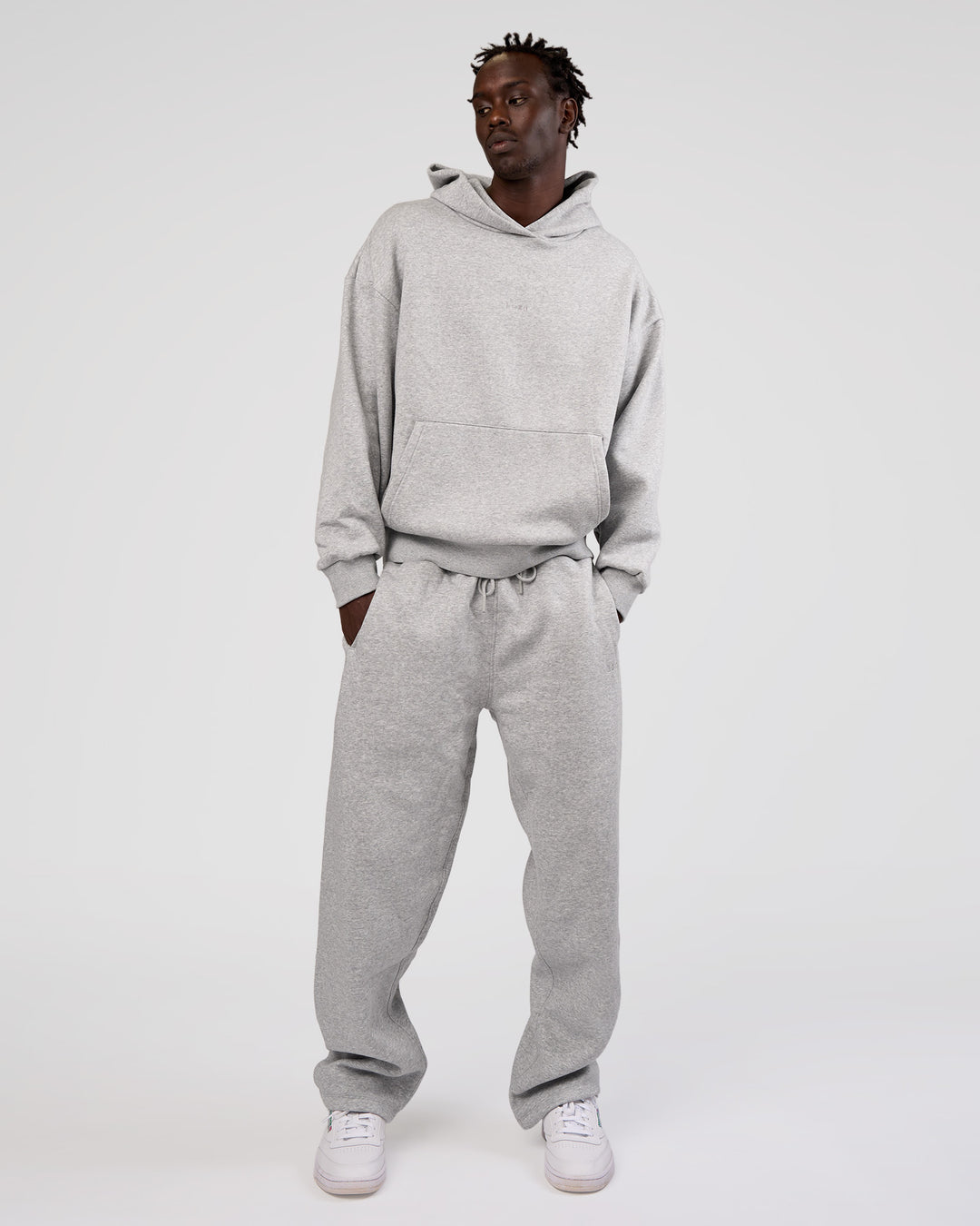 Man wearing MVP Oversized Hoodie - Light Grey Marl | Model:Okello | Size:M