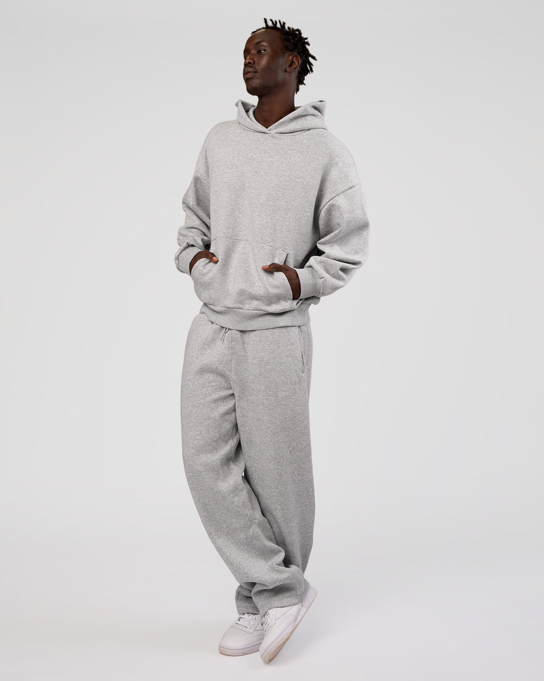 Man wearing MVP Oversized Hoodie - Light Grey Marl | Model:Okello | Size:M