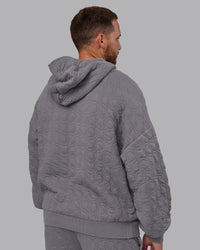 Man wearing MVP Quilted Oversized Hoodie - Storm Front-Geometric | Model:Macca | Size:M