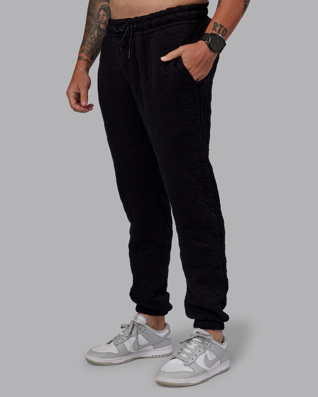 Man wearing MVP Quilted Track Pant - Black-Geometric | Model:Macca | SIze:M