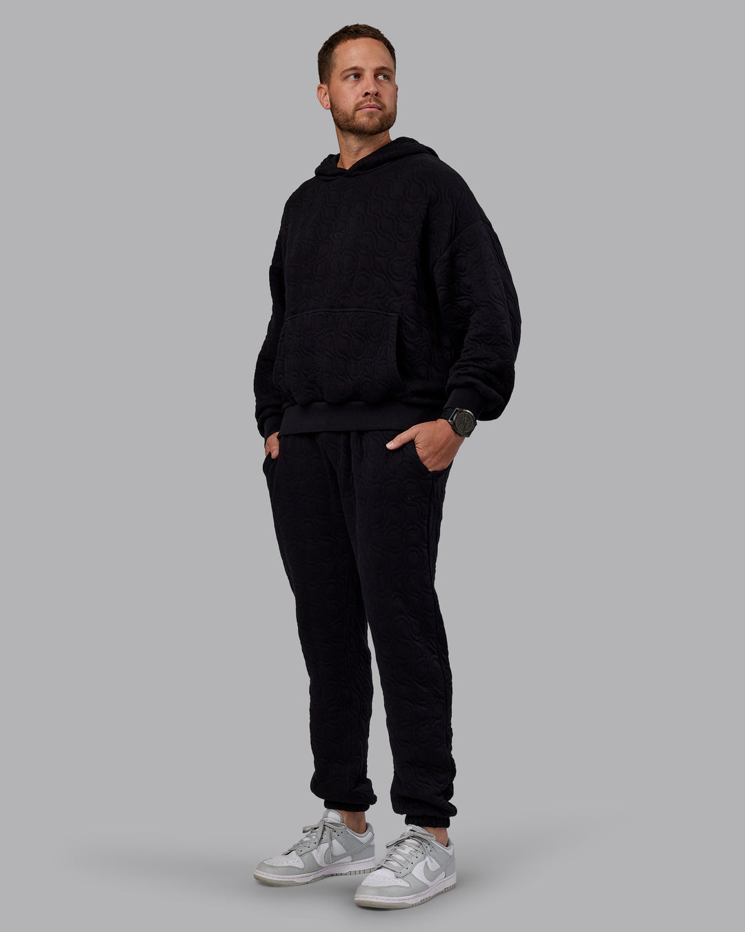 Man wearing MVP Quilted Track Pant - Black-Geometric | Model:Macca | SIze:M