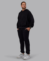 Man wearing MVP Quilted Track Pant - Black-Geometric | Model:Macca | SIze:M