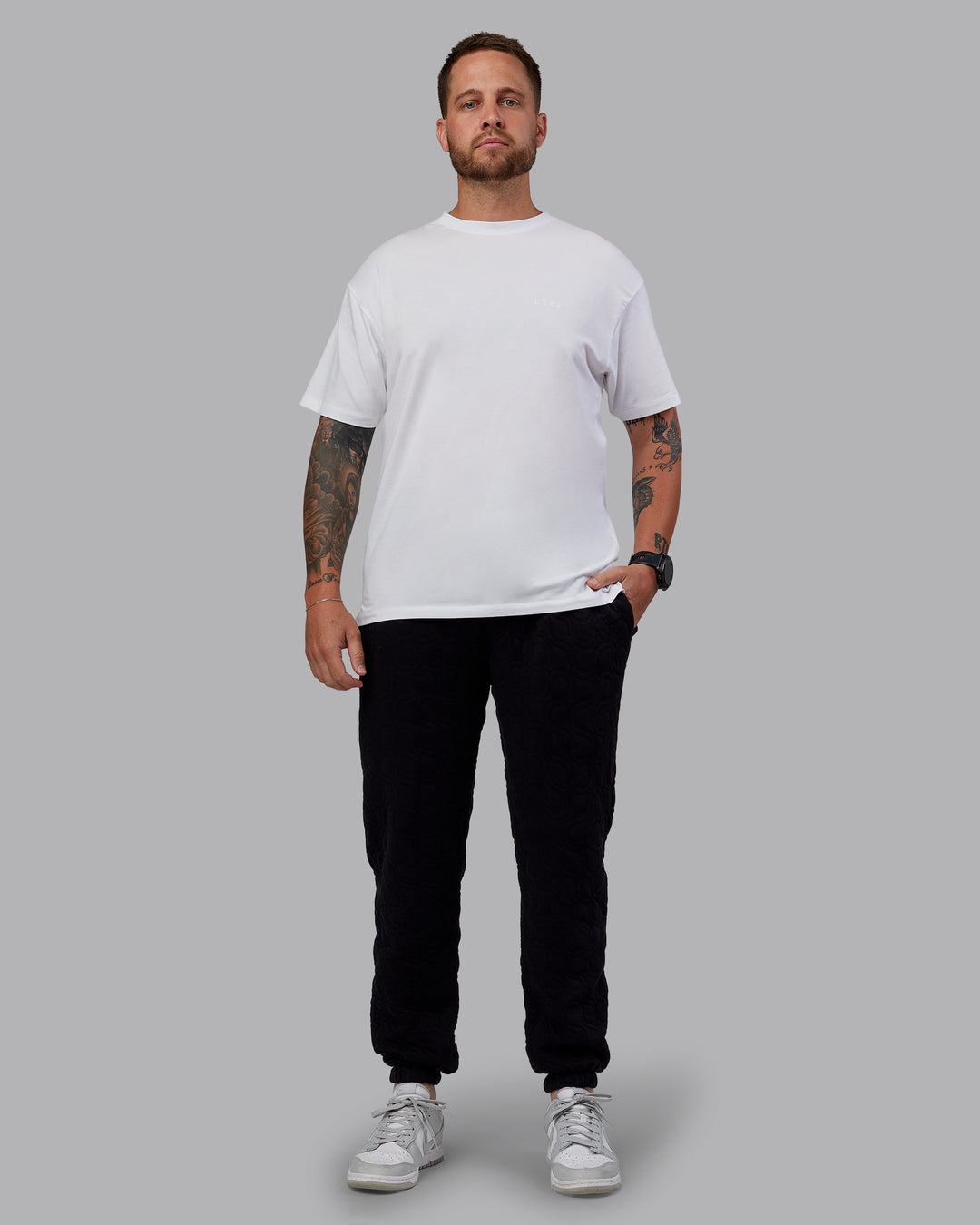 Man wearing MVP Quilted Track Pant - Black-Geometric | Model:Macca | SIze:M