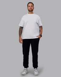 Man wearing MVP Quilted Track Pant - Black-Geometric | Model:Macca | SIze:M
