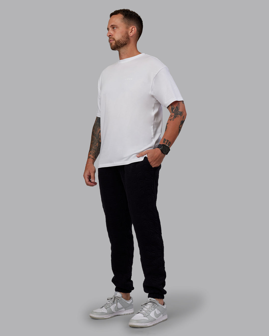 Man wearing MVP Quilted Track Pant - Black-Geometric | Model:Macca | SIze:M