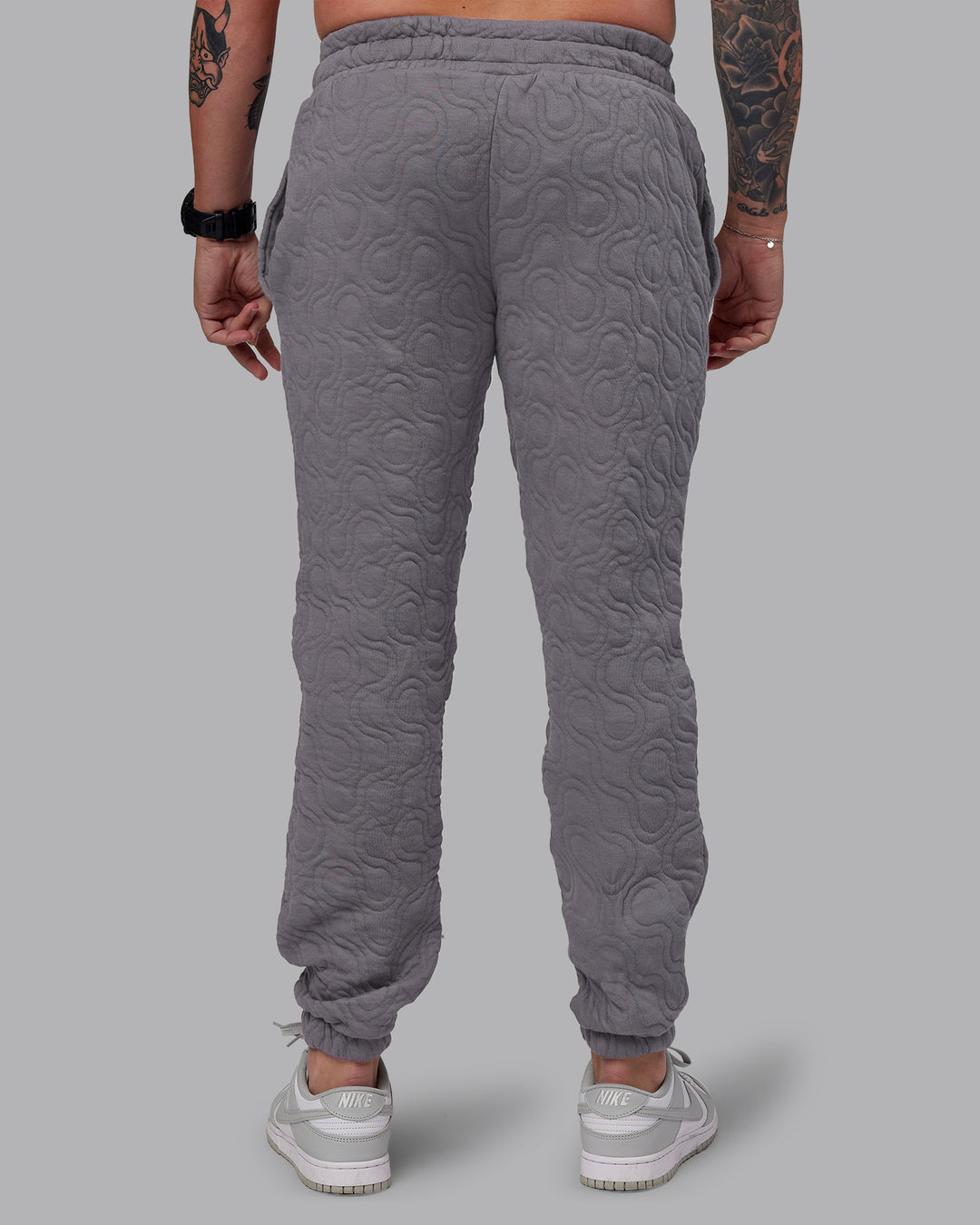 Man wearing MVP Quilted Track Pant - Storm Front-Geometric | Model:Macca | Size:M