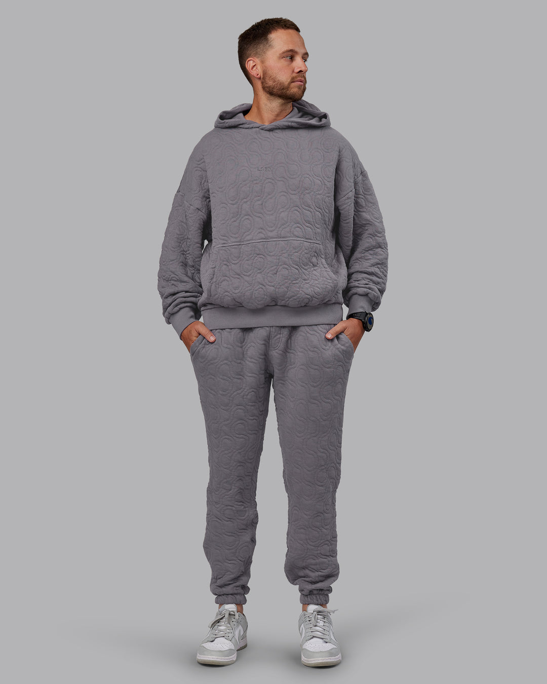 Man wearing MVP Quilted Track Pant - Storm Front-Geometric | Model:Macca | Size:M