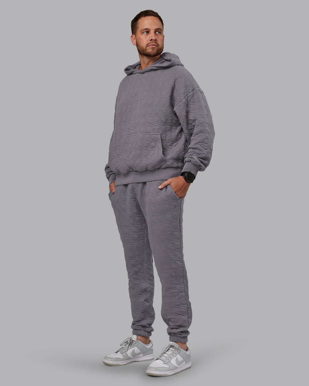 Man wearing MVP Quilted Track Pant - Storm Front-Geometric | Model:Macca | Size:M