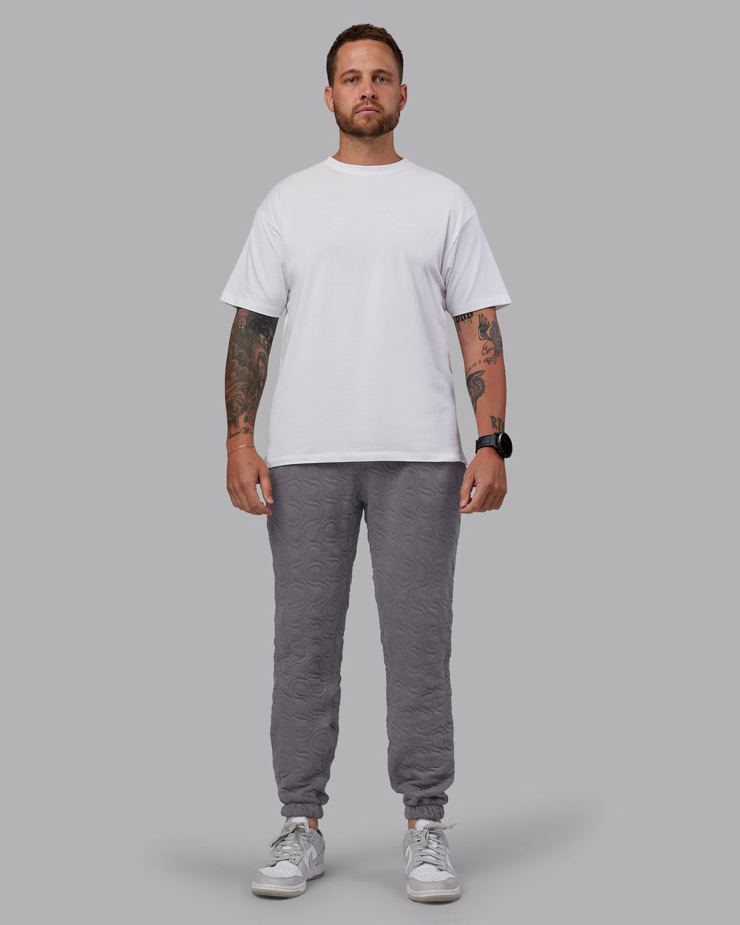 Man wearing MVP Quilted Track Pant - Storm Front-Geometric | Model:Macca | Size:M