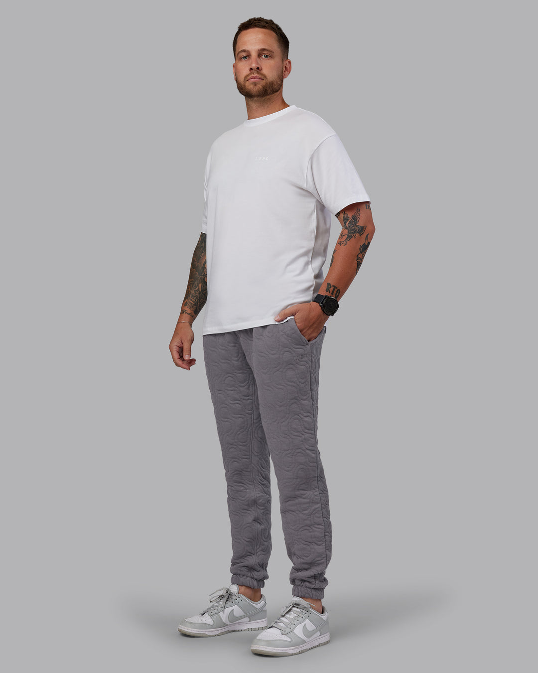 Man wearing MVP Quilted Track Pant - Storm Front-Geometric | Model:Macca | Size:M