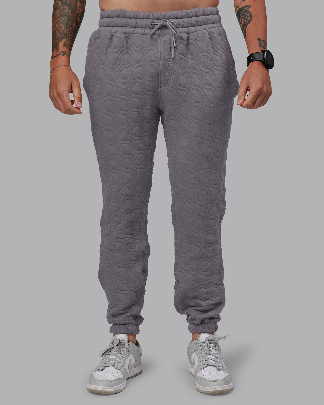 Man wearing MVP Quilted Track Pant - Storm Front-Geometric | Model:Macca | Size:M