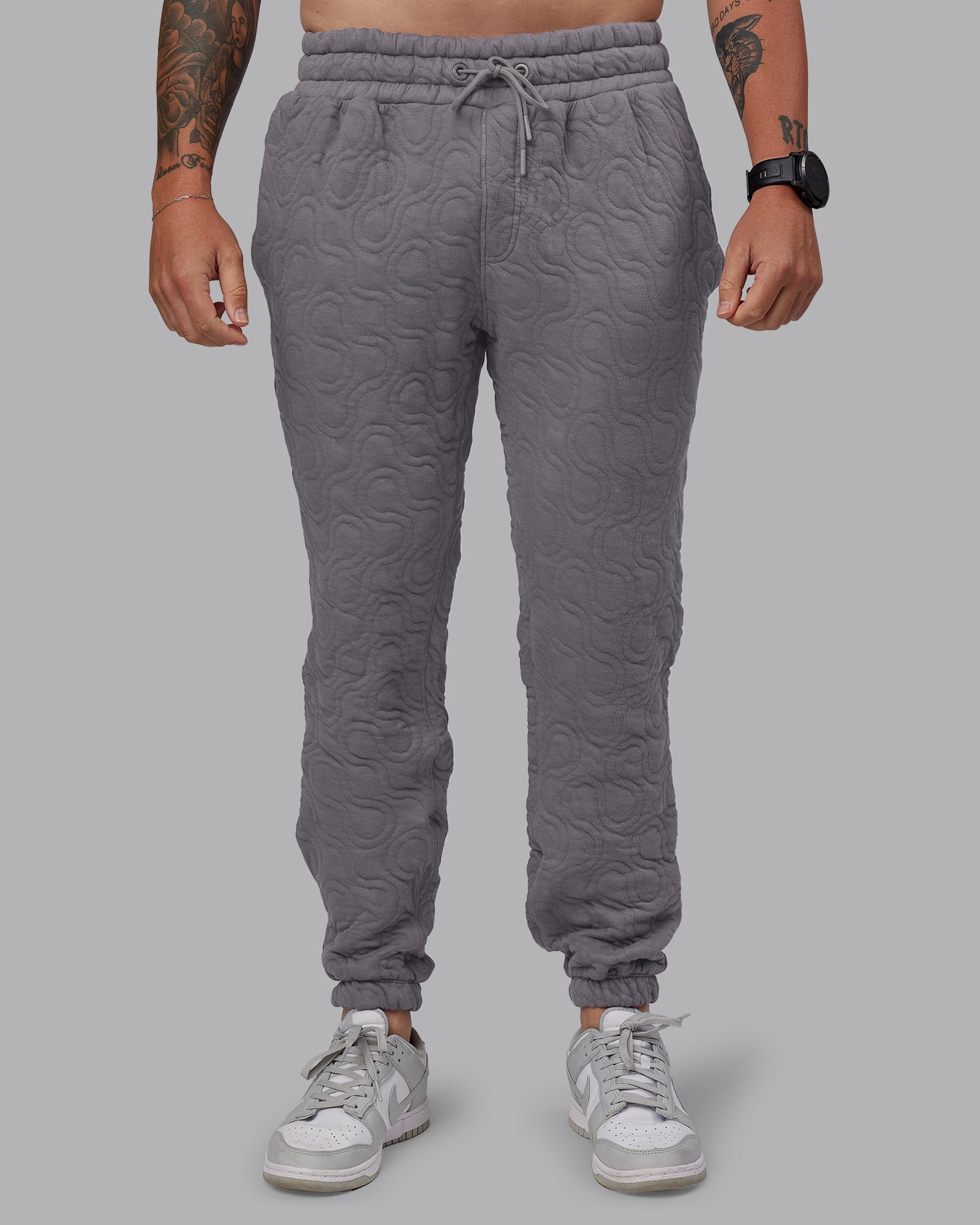 Man wearing MVP Quilted Track Pant - Storm Front-Geometric | Model:Macca | Size:M