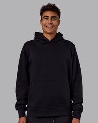 Man wearing MVP Regular Fit Hoodie - Black | Model:Jaxon | Size:M
