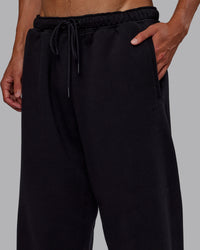 Man wearing MVP Straight Leg Pant - Black | Model:Jaxon | Size:M