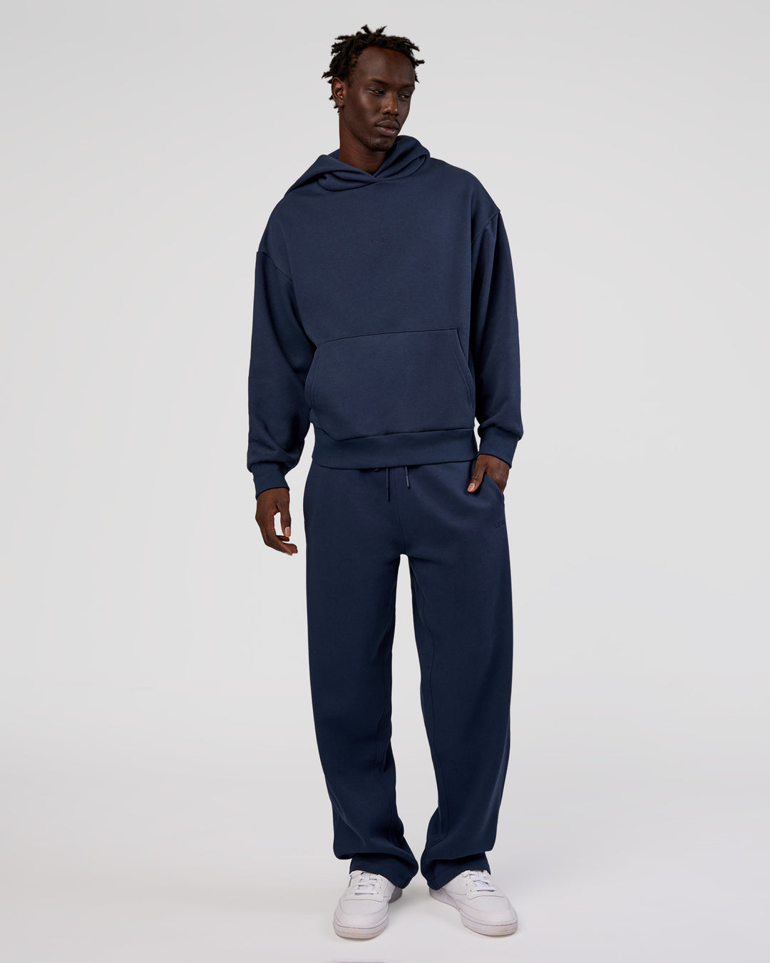 Man wearing MVP Straight Leg Pant - Future Navy | Model:Okello | Size:M