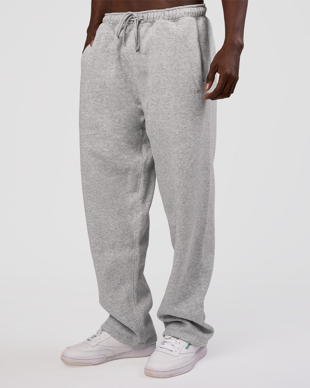 Man wearing MVP Straight Leg Pant - Light Grey Marl | Model:Okello | Size:M