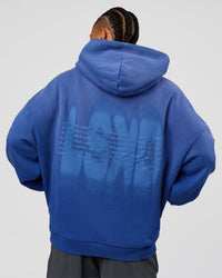 Man wearing Memory In Motion Ultra Heavyweight Washed Hoodie - Electric Indigo Washed | Model:Malebo | Size:M