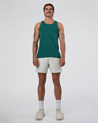 Man wearing AeroFLX+ Seamless Tank - Transformative Teal/Transformative Teal | Model:Konnor | Size:M