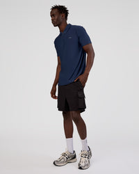 Man wearing Drive Polo - Future Navy | Model:Okello | Size:M