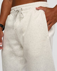 Man wearing MVP Cuffed Track Pant - Silver Marl | Model:Malebo | Size:M