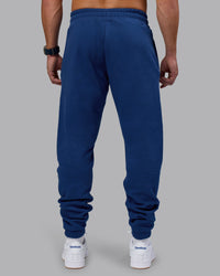 Man wearing MVP Track Pant - Midnight Blue | Model:Jaiden | Size:M