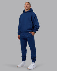 Man wearing MVP Track Pant - Midnight Blue | Model:Jaiden | Size:M