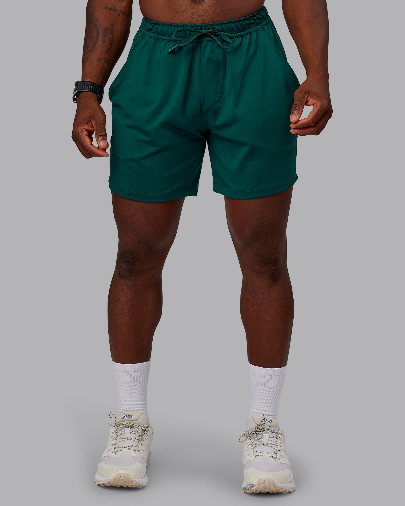 Man wearing Restore CloudFLX Short in Dark Moss | Size:M | Model:Sam