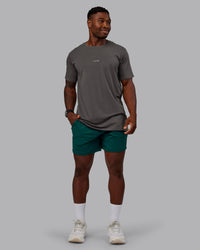 Man wearing Restore CloudFLX Short in Dark Moss | Size:M | Model:Sam