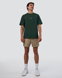 Man wearing Merry Journey FLXCotton Oversized Tee - Vital Green-White | Model:Konnor | Size:M