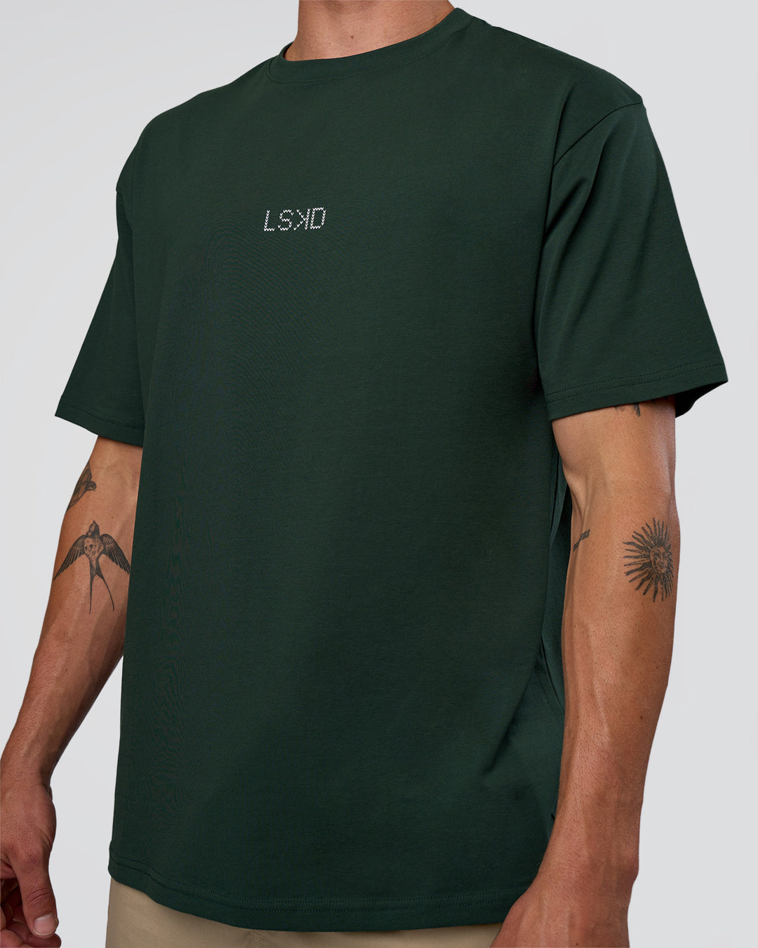 Man wearing Merry Journey FLXCotton Oversized Tee - Vital Green-White | Model:Konnor | Size:M