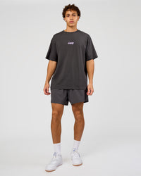 Man wearing Miami Snatch FLXCotton Oversized Tee - Dark Storm-Marshmallow | Model:Leandro | Size:M