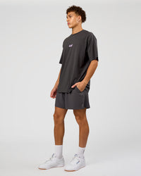 Man wearing Miami Snatch FLXCotton Oversized Tee - Dark Storm-Marshmallow | Model:Leandro | Size:M