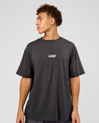 Man wearing Miami Snatch FLXCotton Oversized Tee - Dark Storm-Marshmallow | Model:Leandro | Size:M
