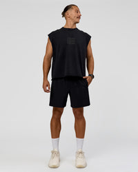 Man wearing Move Fast Heavyweight Boxed Tank - Black Washed | Model:Jaiden | Size:M