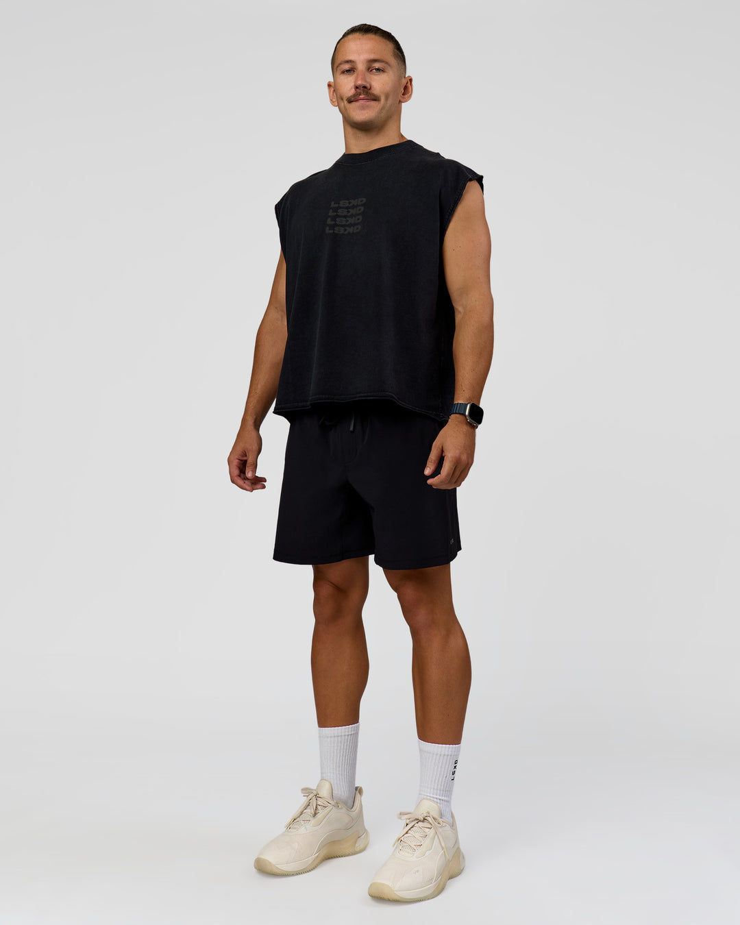 Man wearing Move Fast Heavyweight Boxed Tank - Black Washed | Model:Jaiden | Size:M