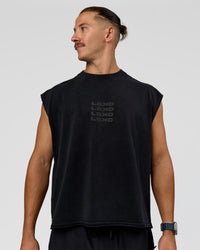 Man wearing Move Fast Heavyweight Boxed Tank - Black Washed | Model:Jaiden | Size:M