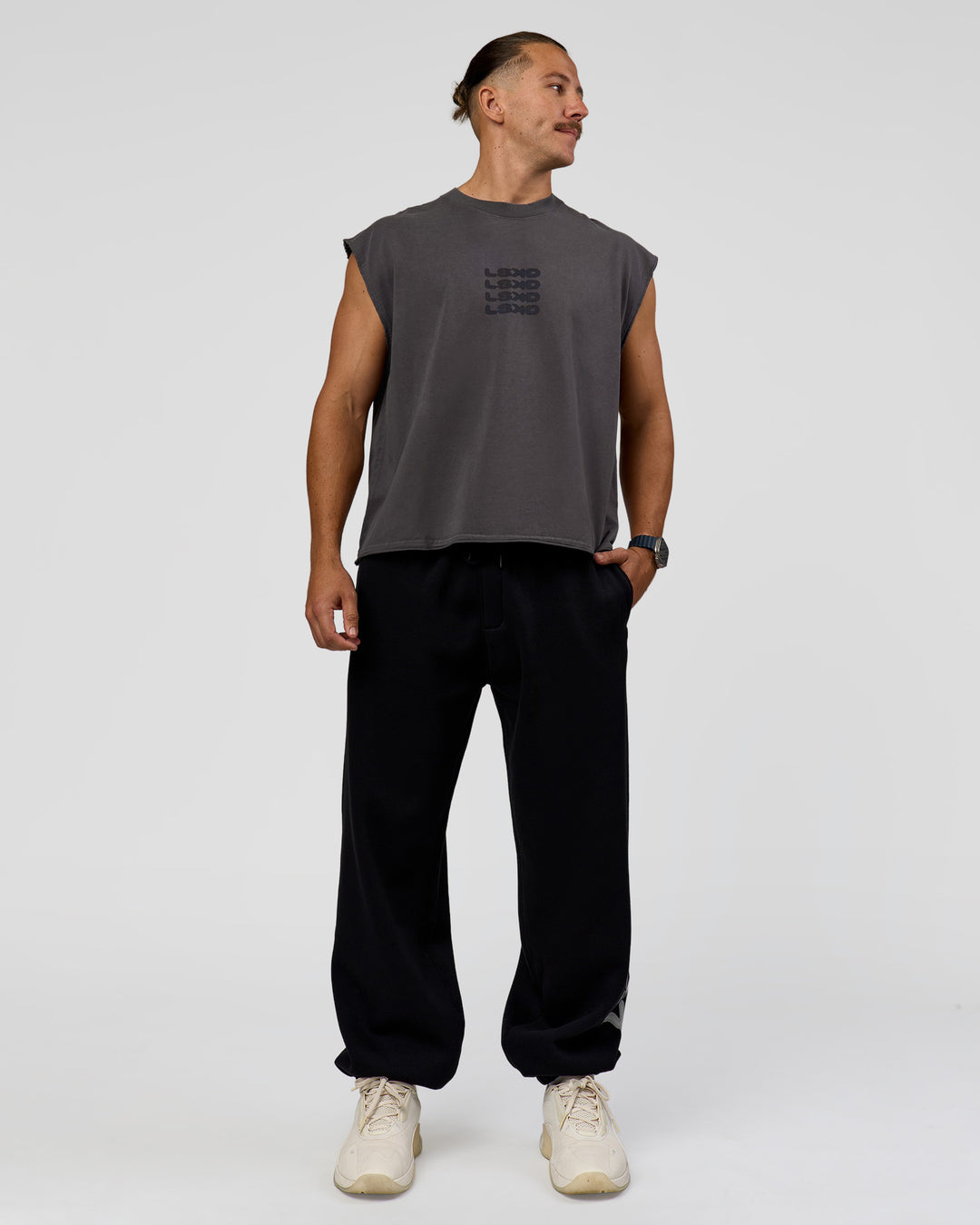 Man wearing Move Fast Heavyweight Boxed Tank - Dark Storm Washed | Model:Jaiden | Size:M