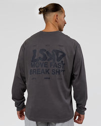 Man wearing Move Fast Heavyweight Oversized Long Sleeve Tee - Dark Storm Washed | Model:Jaiden | Size:M