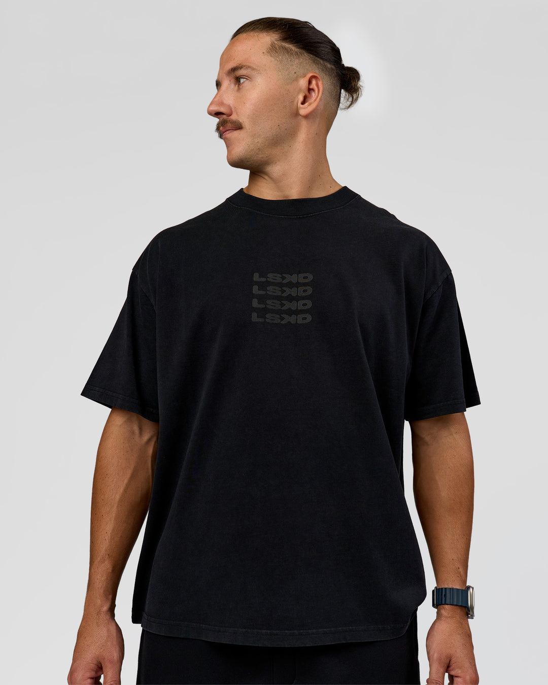 Man wearing Move Fast Heavyweight Oversized Tee - Black Washed | Model:Jaiden | Size:M