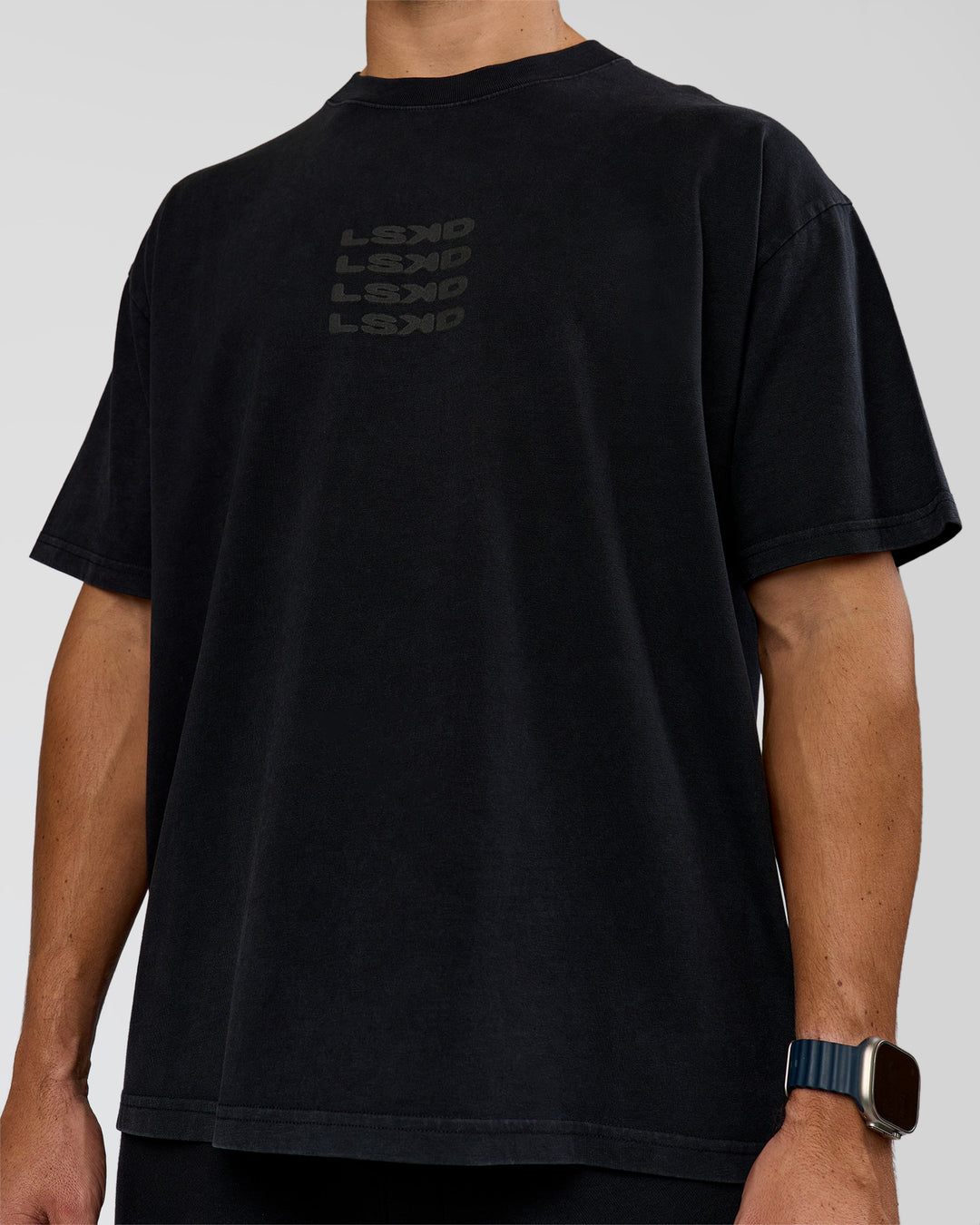 Man wearing Move Fast Heavyweight Oversized Tee - Black Washed | Model:Jaiden | Size:M