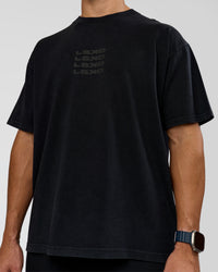 Man wearing Move Fast Heavyweight Oversized Tee - Black Washed | Model:Jaiden | Size:M