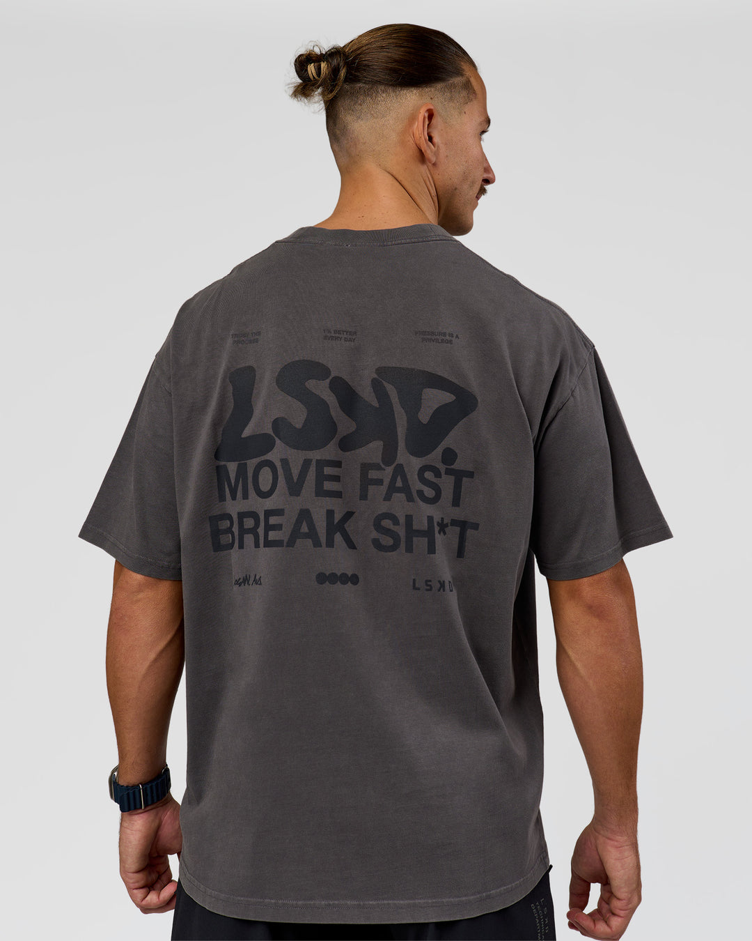 Man wearing Move Fast Heavyweight Oversized Tee - Dark Storm Washed | Model:Jaiden | Size:M