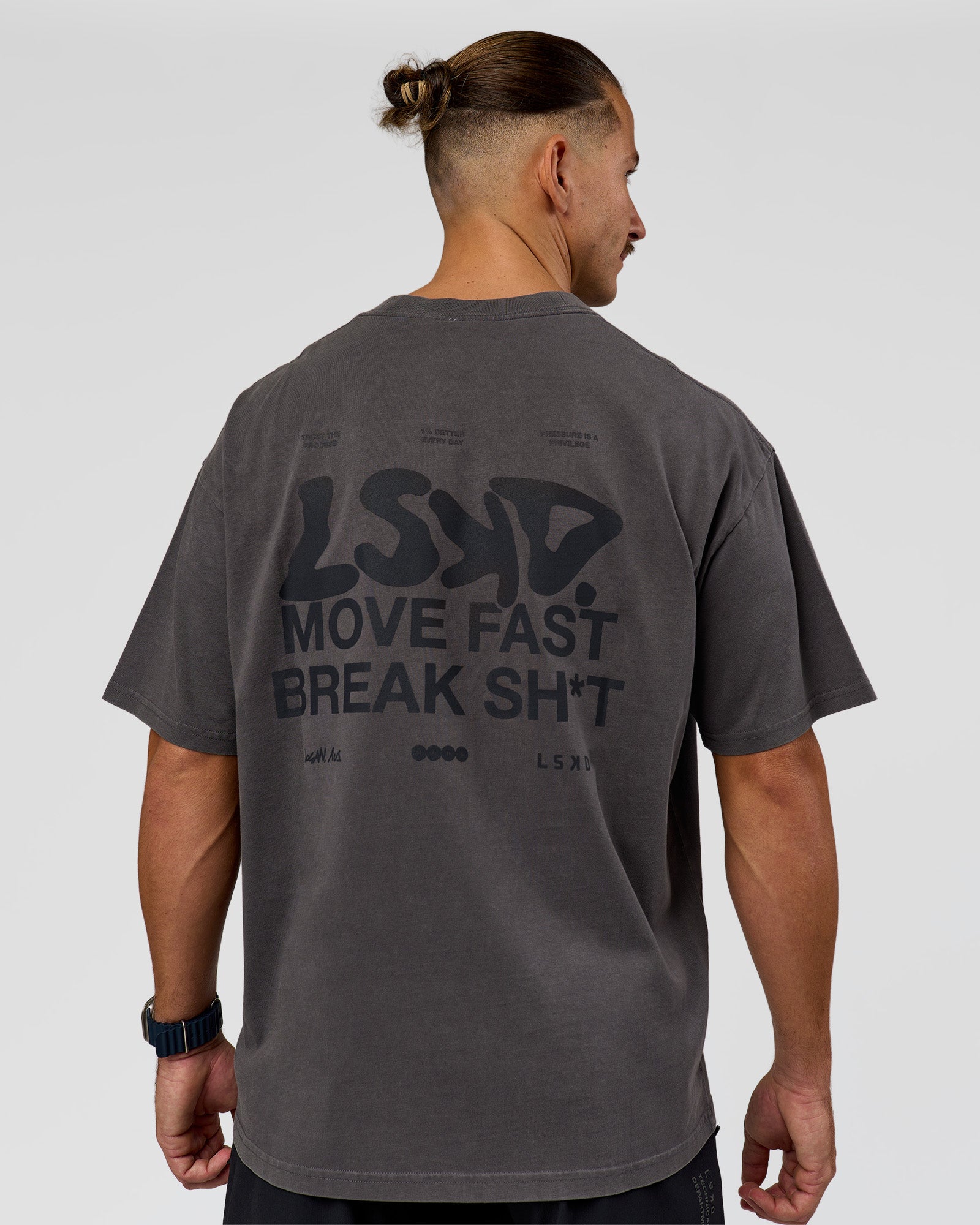 Man wearing Move Fast Heavyweight Oversized Tee - Dark Storm Washed | Model:Jaiden | Size:M
