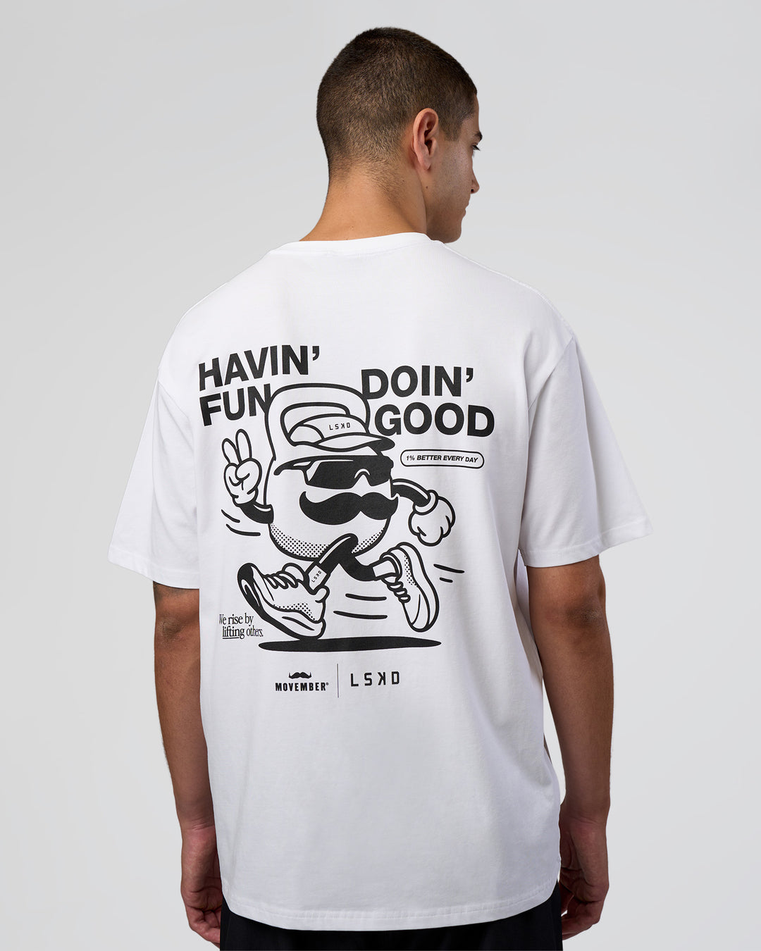 Man wearing Movember 2025 FLXCotton Oversize Tee - White | Model:Zoran | Size:M