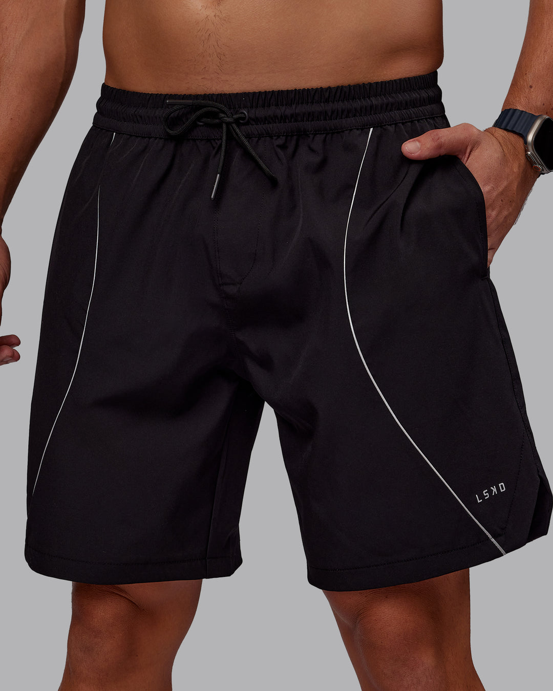 Man wearing Nocturnal 8” Short - Black | Model:Jaiden | Size:M