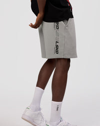 Man wearing Nothing Is Impossible 6" Short - Alloy-Black | Model:Okello | Size:M