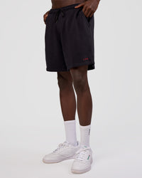 Man wearing Nothing Is Impossible 6" Short - Black-Flame | Model:Okello | Size:M