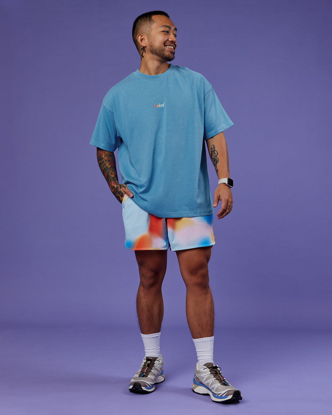 Man wearing Our Journey Heavyweight Oversized Tee - Azure Blue-Rainbow | Model:Justin | Size:M