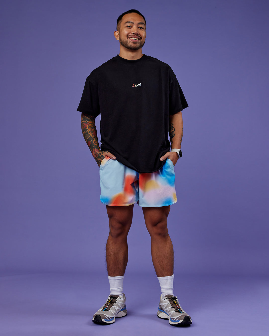 Man wearing Our Journey Heavyweight Oversized Tee - Black-Rainbow | Model:Justin | Size:M