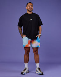 Man wearing Our Journey Heavyweight Oversized Tee - Black-Rainbow | Model:Justin | Size:M